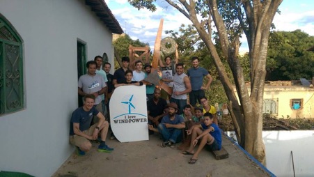 Group picture before final assembly of wooden tower, rotor, blades and tail.