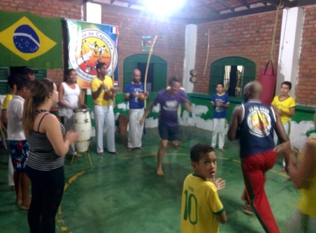 Marco, Mark and Nick and some local students receiving a capoeira lesson from Luis, Master “Marreta”, the owner of the school.